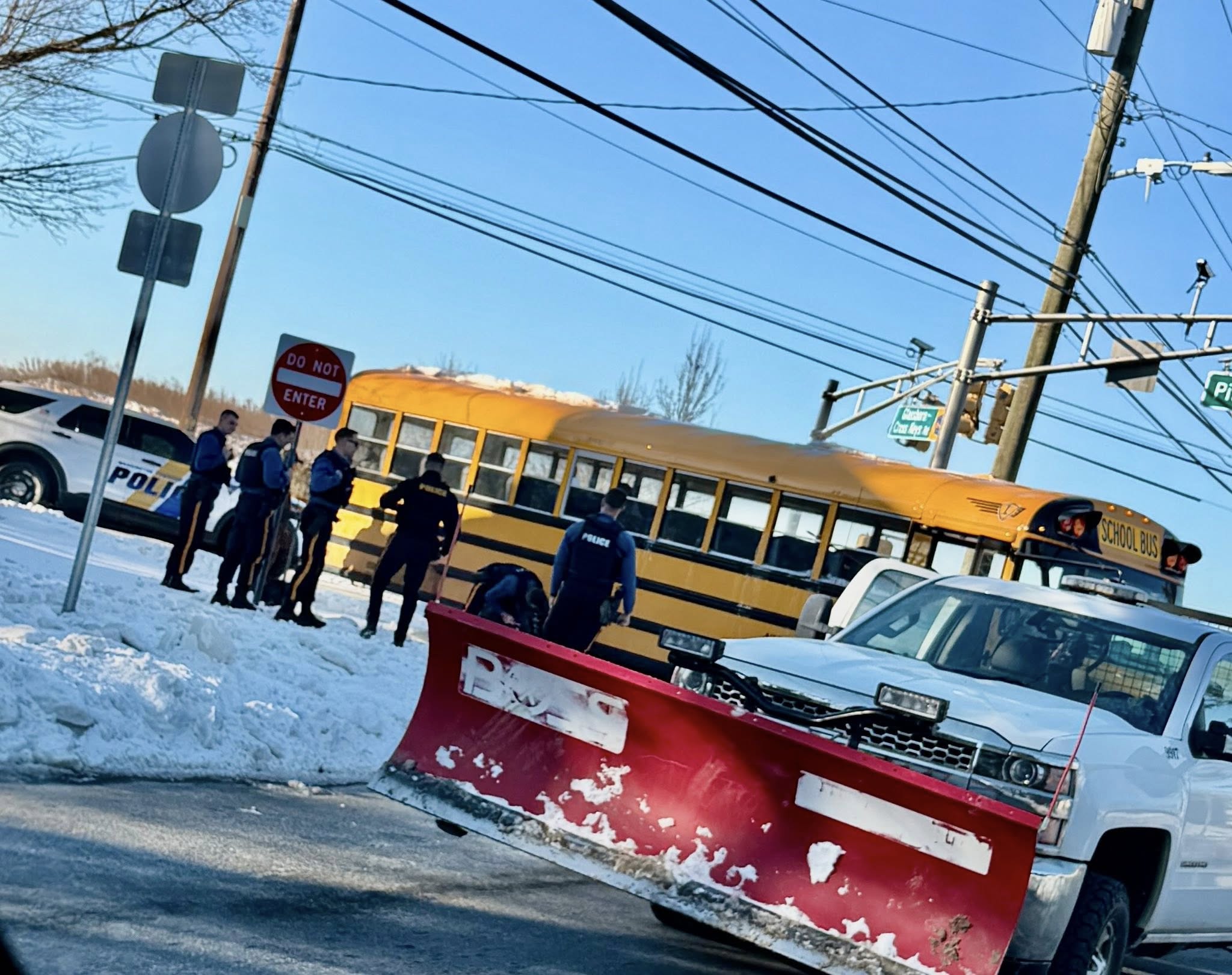 Quick-thinking New Jersey officers help free school bus stuck in snow