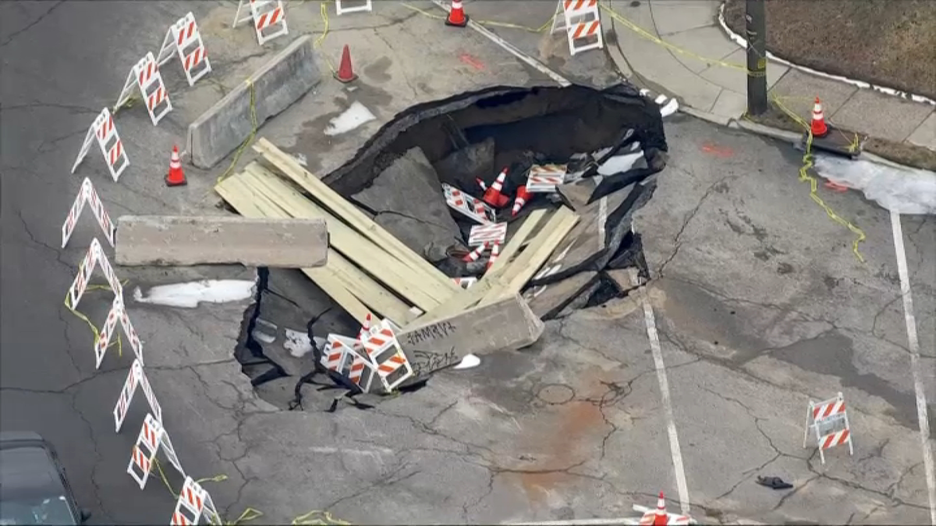 Crews respond to water main break and sinkhole in Philly street
