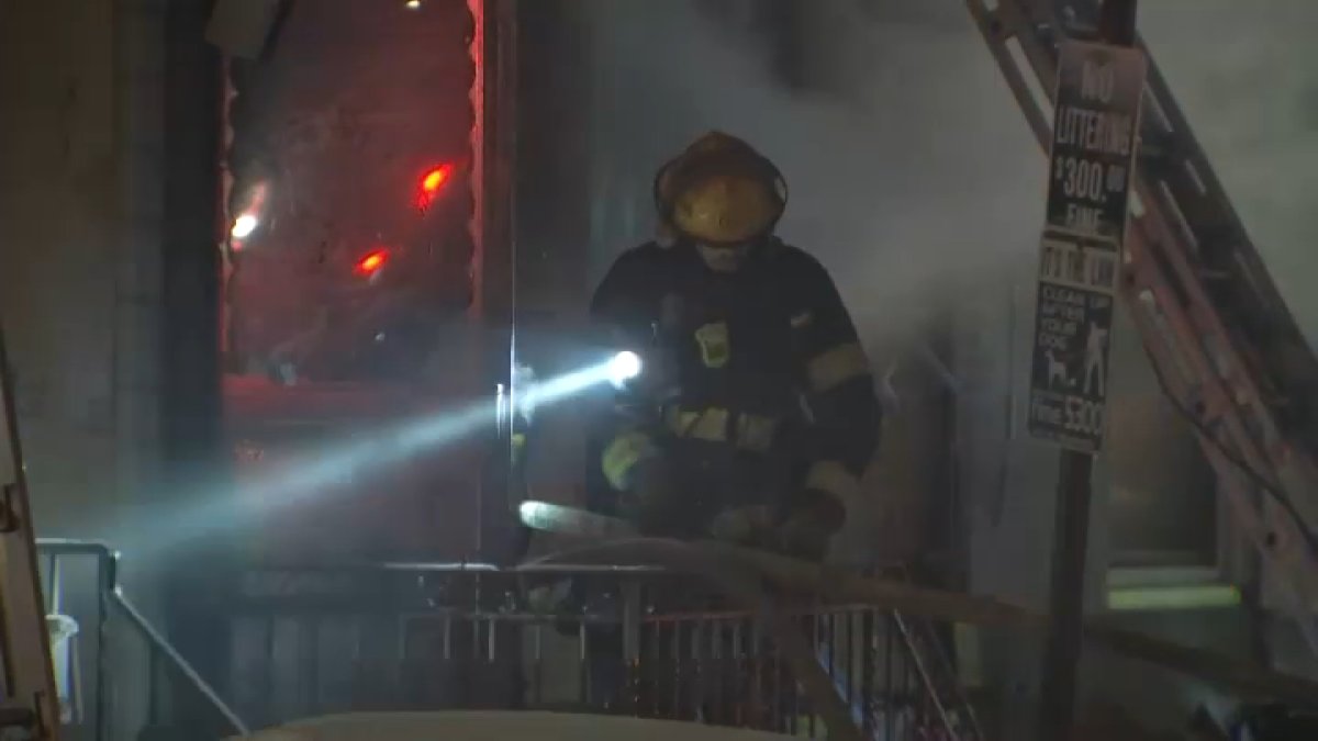 Firefighters extinguish flames at South Philly rowhome