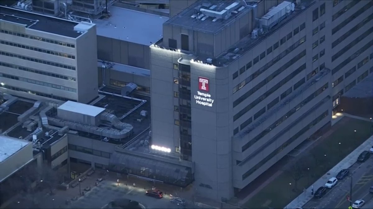 Officials say a man was recaptured near Broad Street and Erie Avenue after escaping police custody at Temple Hospital early Thursday.