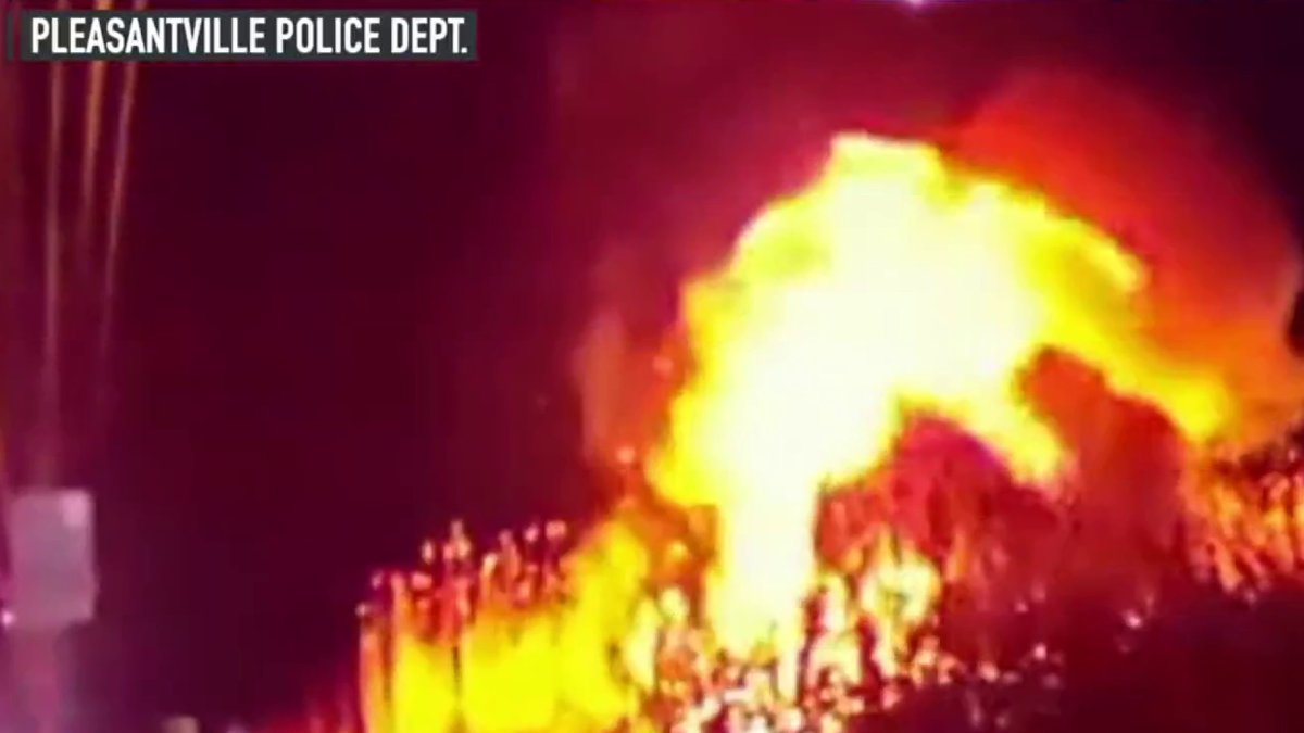 Video: Officer and good Samaritans rescue driver from burning SUV in NJ ...