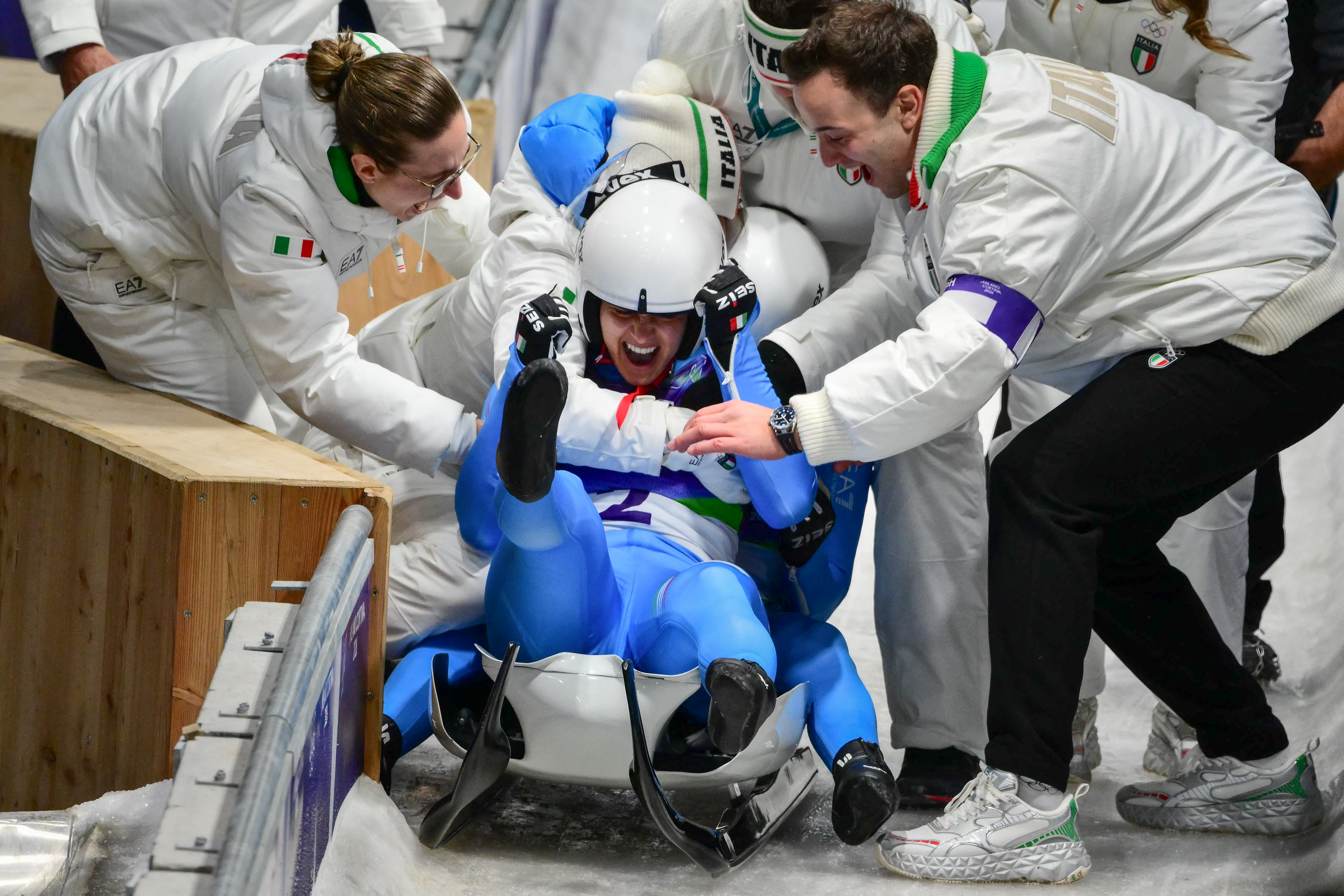 Italy's Andrea Voetter and Marion Oberhofer celebrate