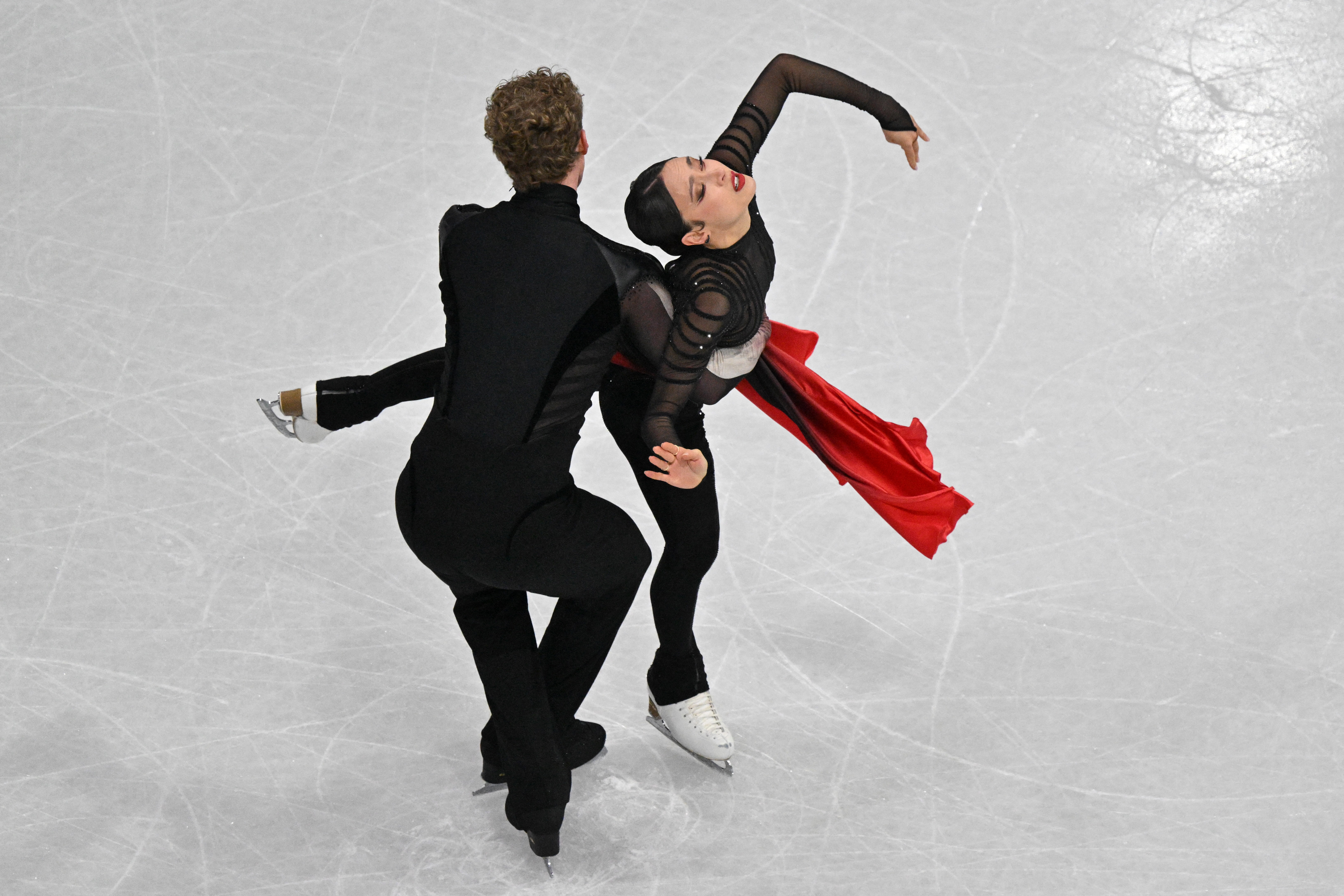 Madison Chock and Evan Bates compete in the figure skating ice dance