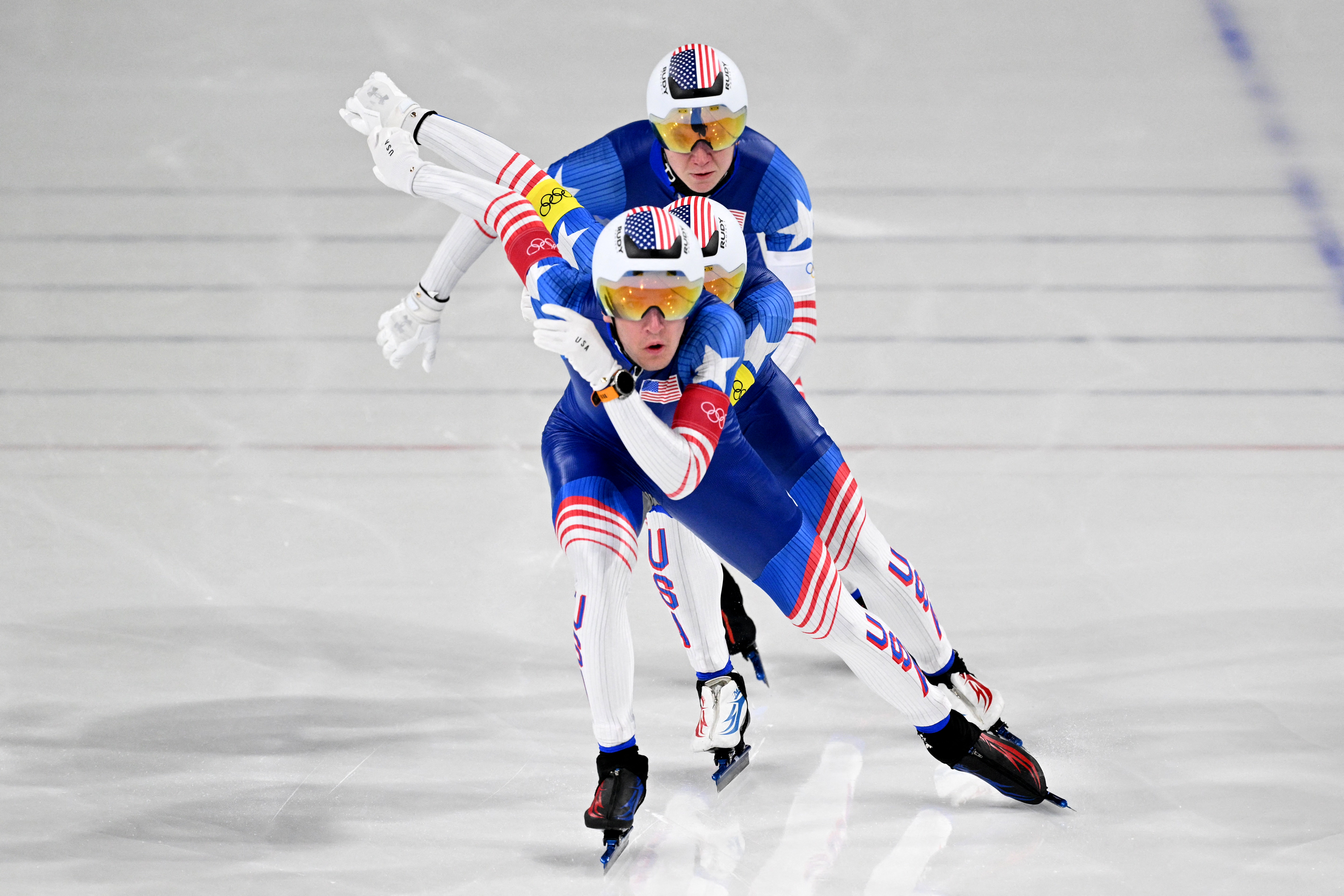 Team USA competes in the speed skating men's team pursuit