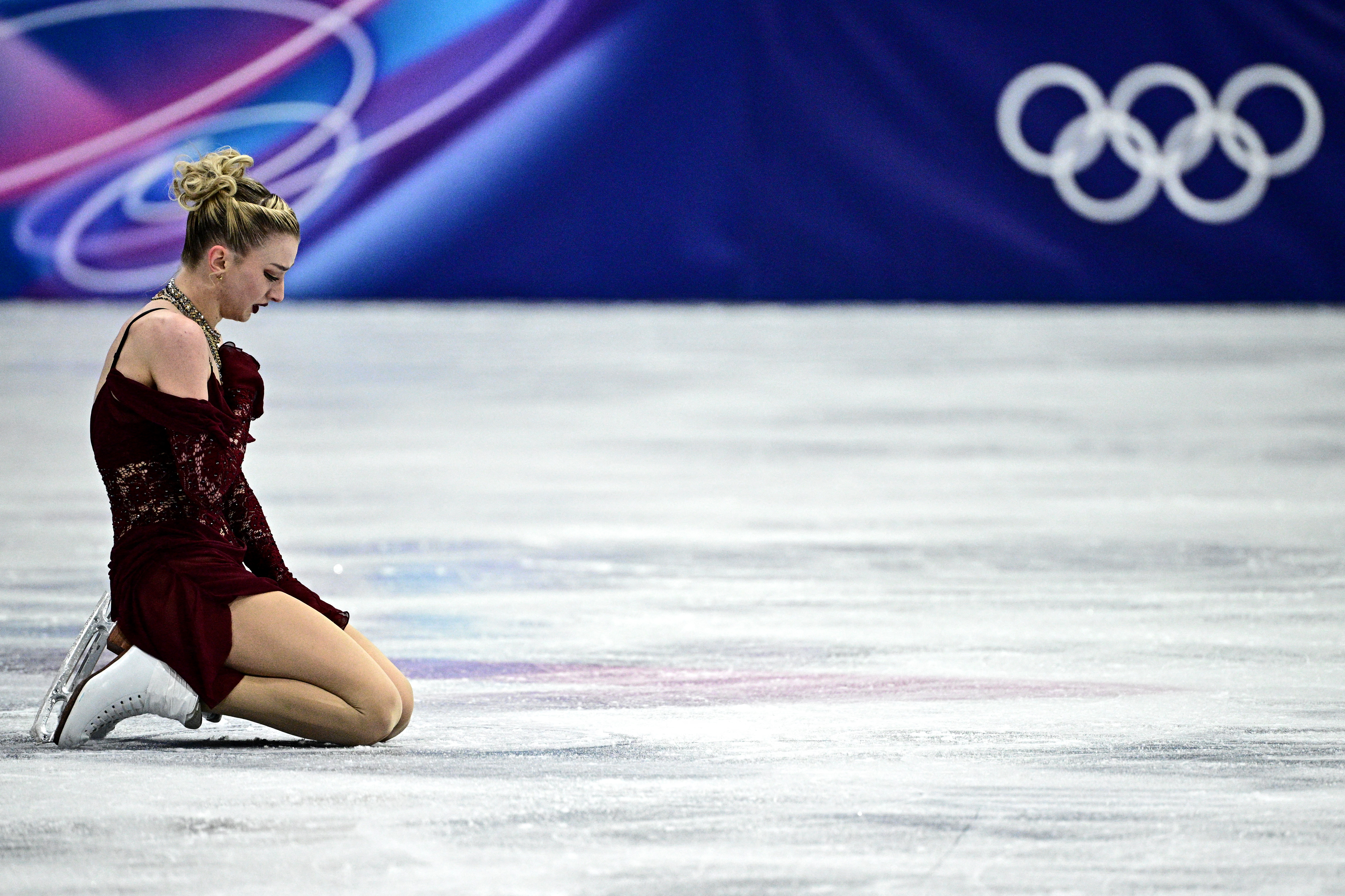 Amber Glenn reacts after competing in the figure skating women's single skating short program.