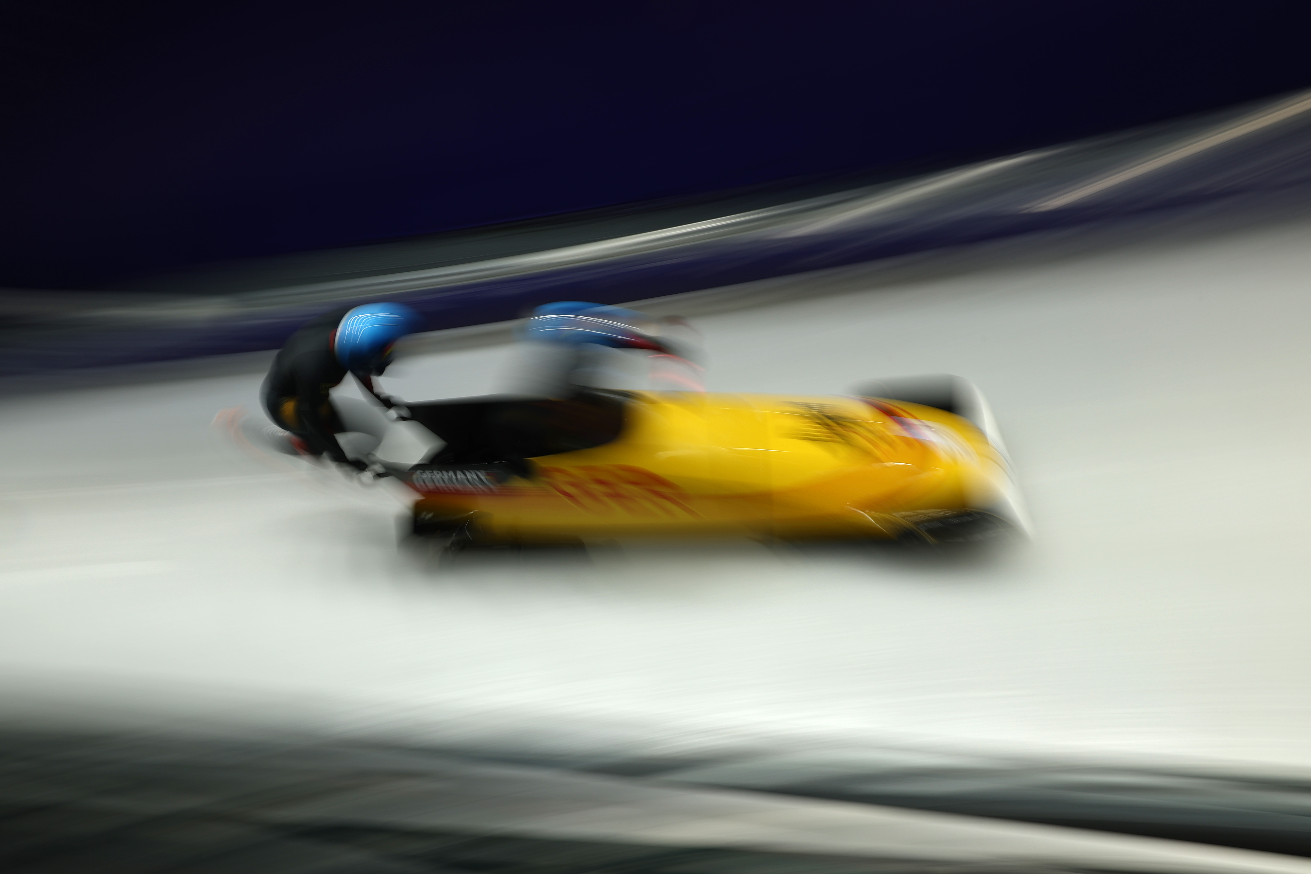 Adam Ammour and Alexander Schaller of Team Germany start the Two-Man Bobsleigh Heat 4 on day 11.