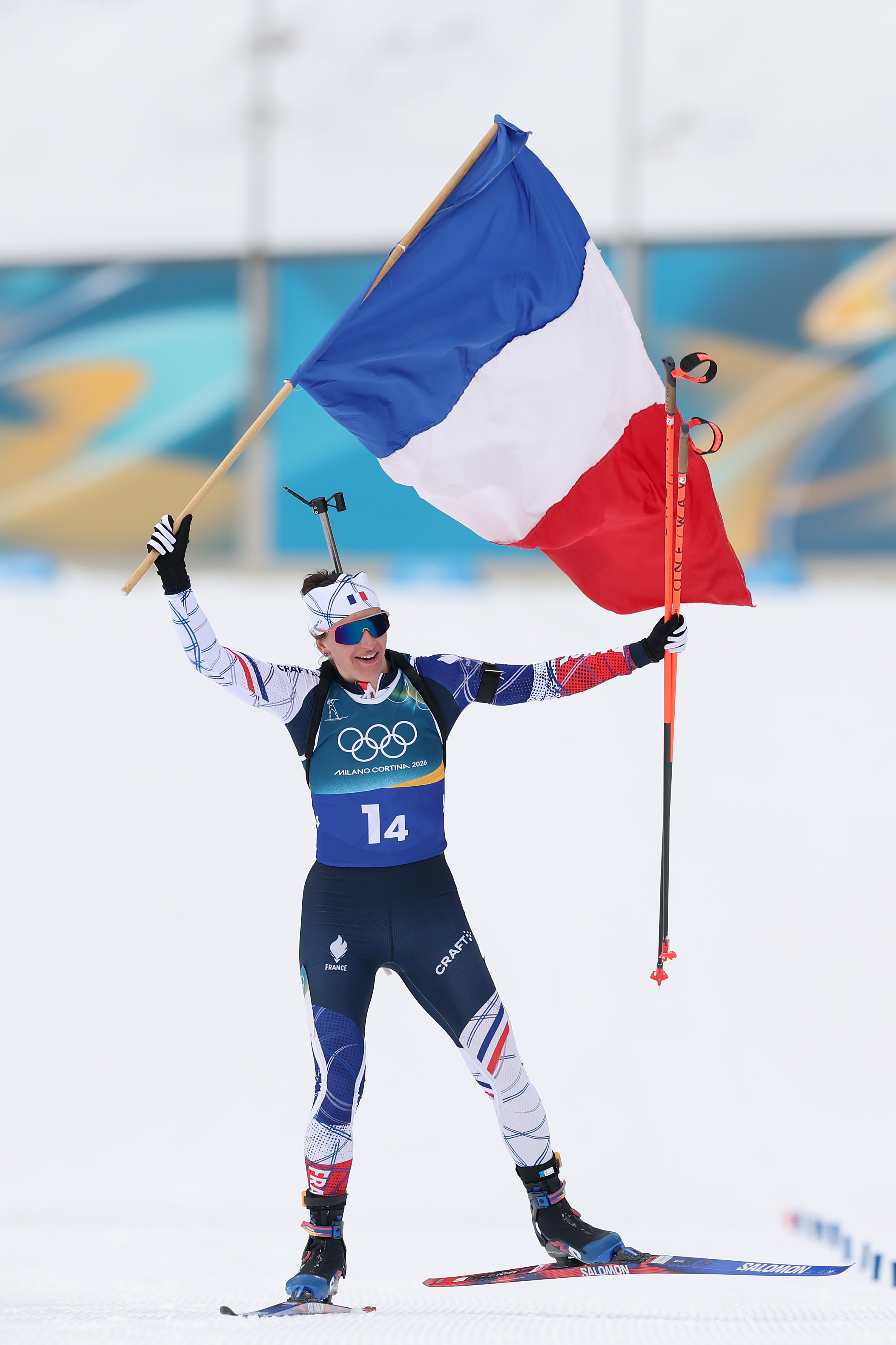 Julia Simon of Team France holding French flag
