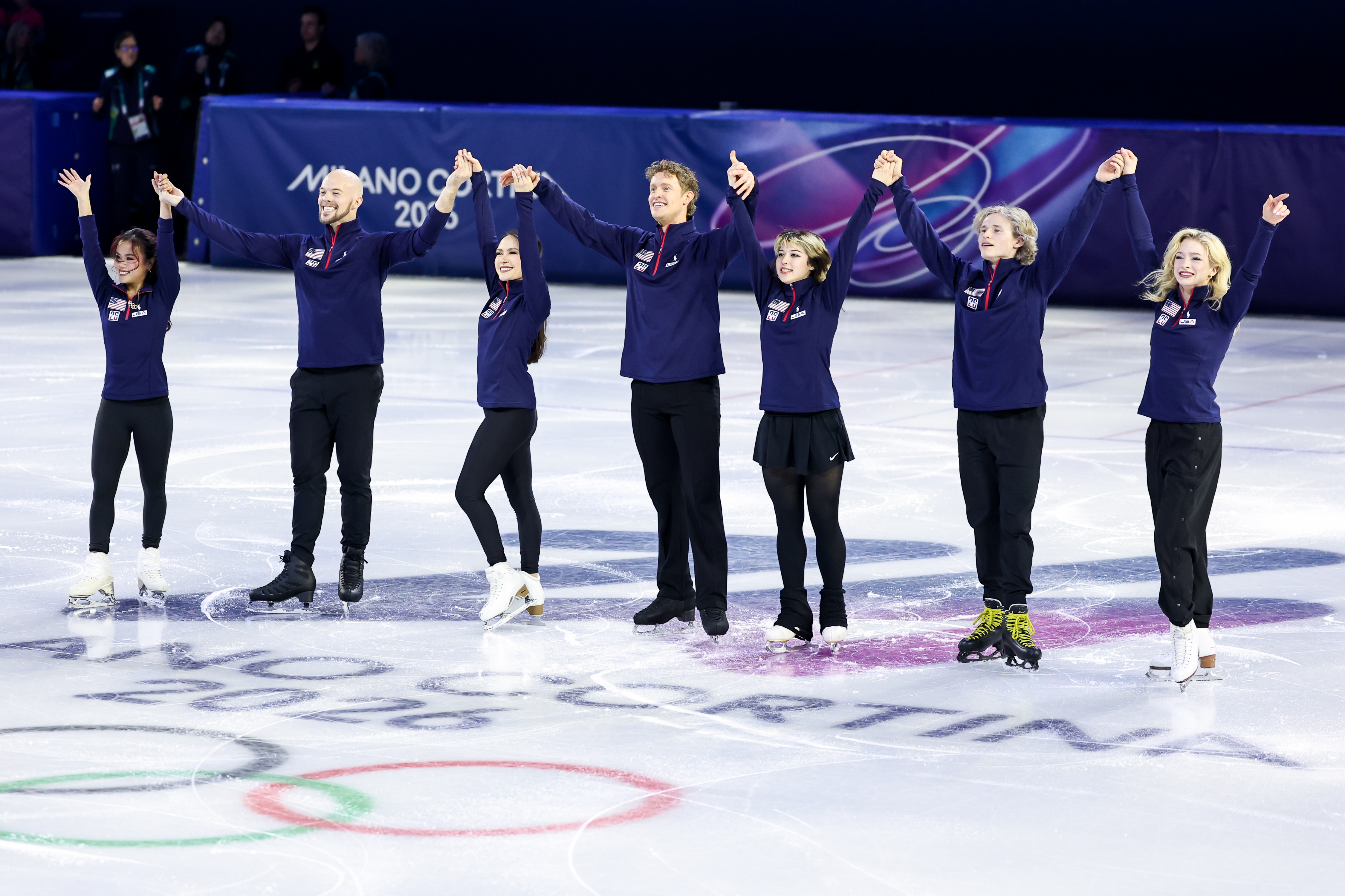 (Left to Right) Ellie Kam, Danny O'Shea, Madison Chock, Evan Bates, Alysa Liu, Ilia Malinin and Amber Glenn of Team United States perform in the Team Event routine during the Figure Skating Exhibition Gala.