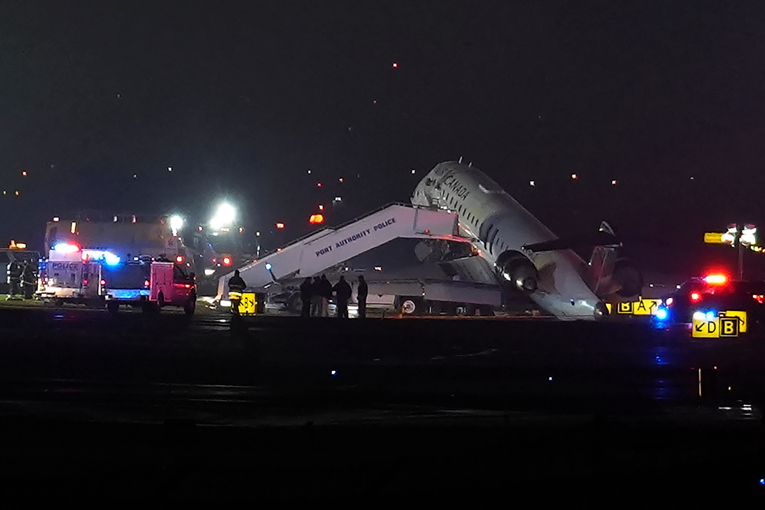 Plane collides with vehicle at LaGuardia Airport runway; at least 4 hurt, including 2 PAPD officers