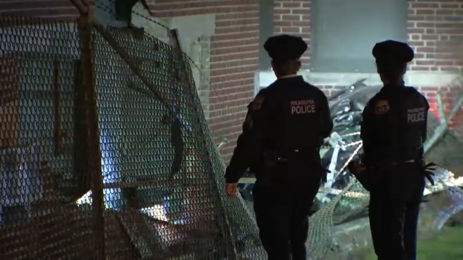 Police: 2 injured after vehicle strikes building in East Falls overnight