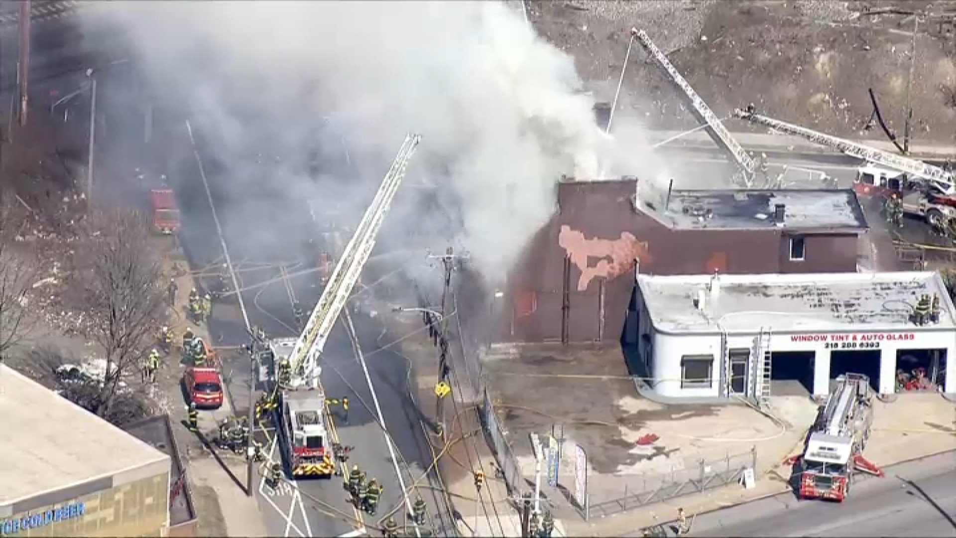 Large fire at building in Philadelphia sends massive plumes of smoke into air
