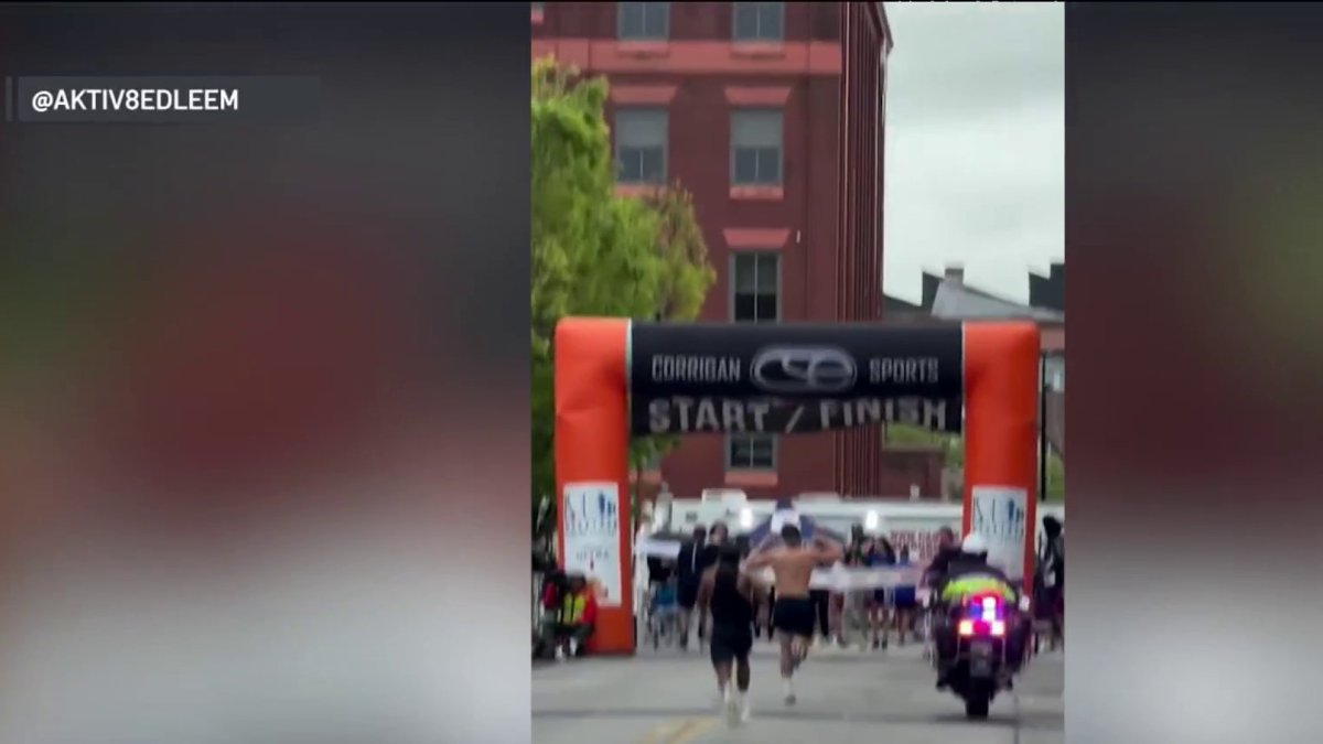 Man speeds past leading runner in photo finish at Delaware Marathon