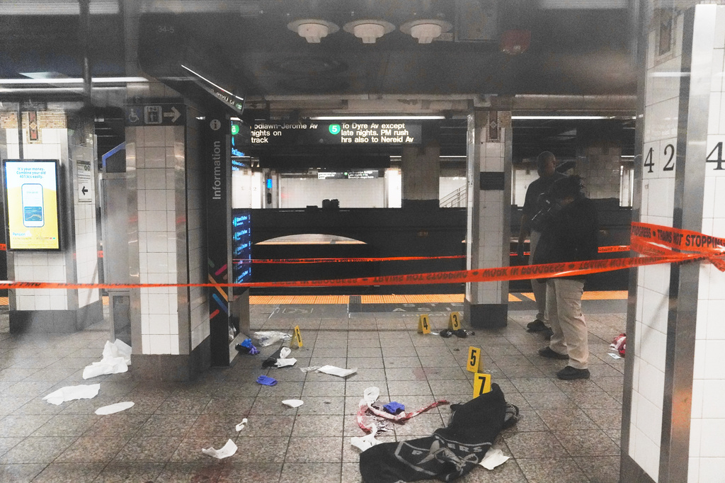Stabbings on New York subway leaves 3 hurt as officers shoot and kill knife-wielding man
