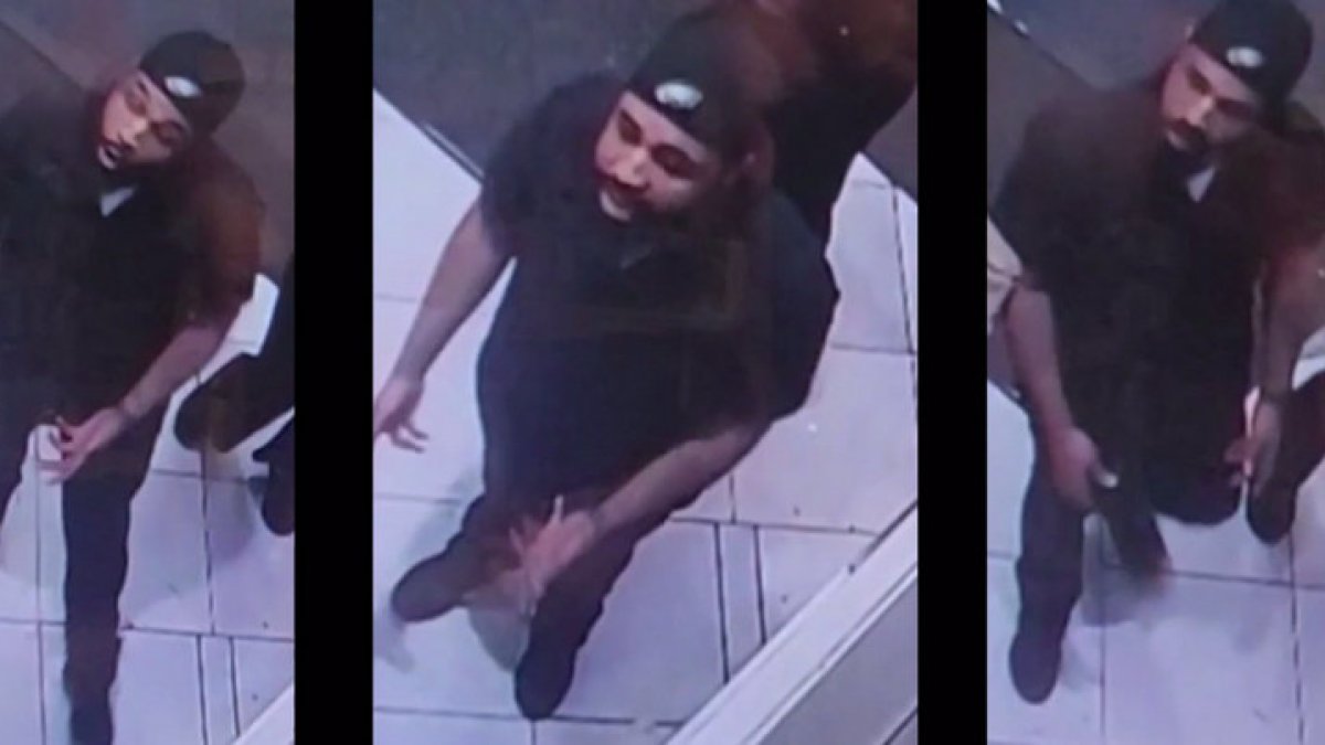 Caught on Camera: Man sought after woman attacked in store on Market Street