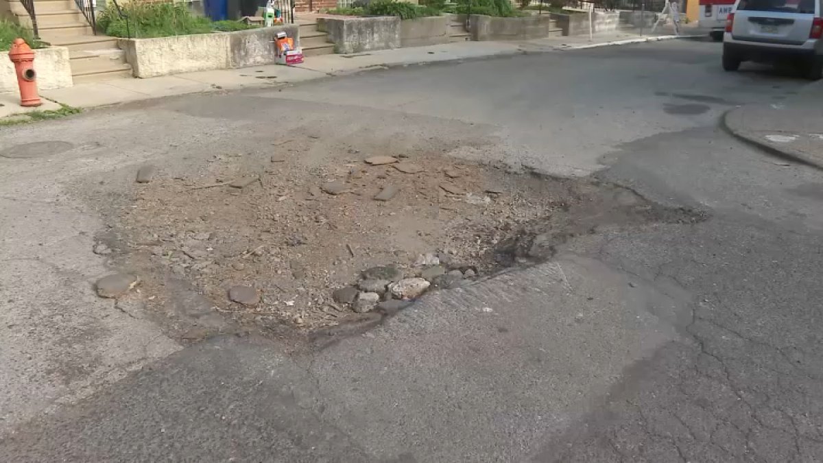 ‘Something needs to be done': Neighbors demand repairs for growing Olney pothole