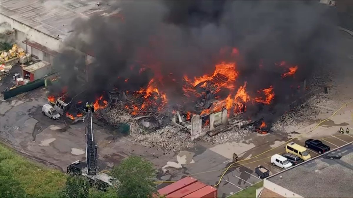 Live: Black smoke fills skies during fire at MontCo playground equipment company