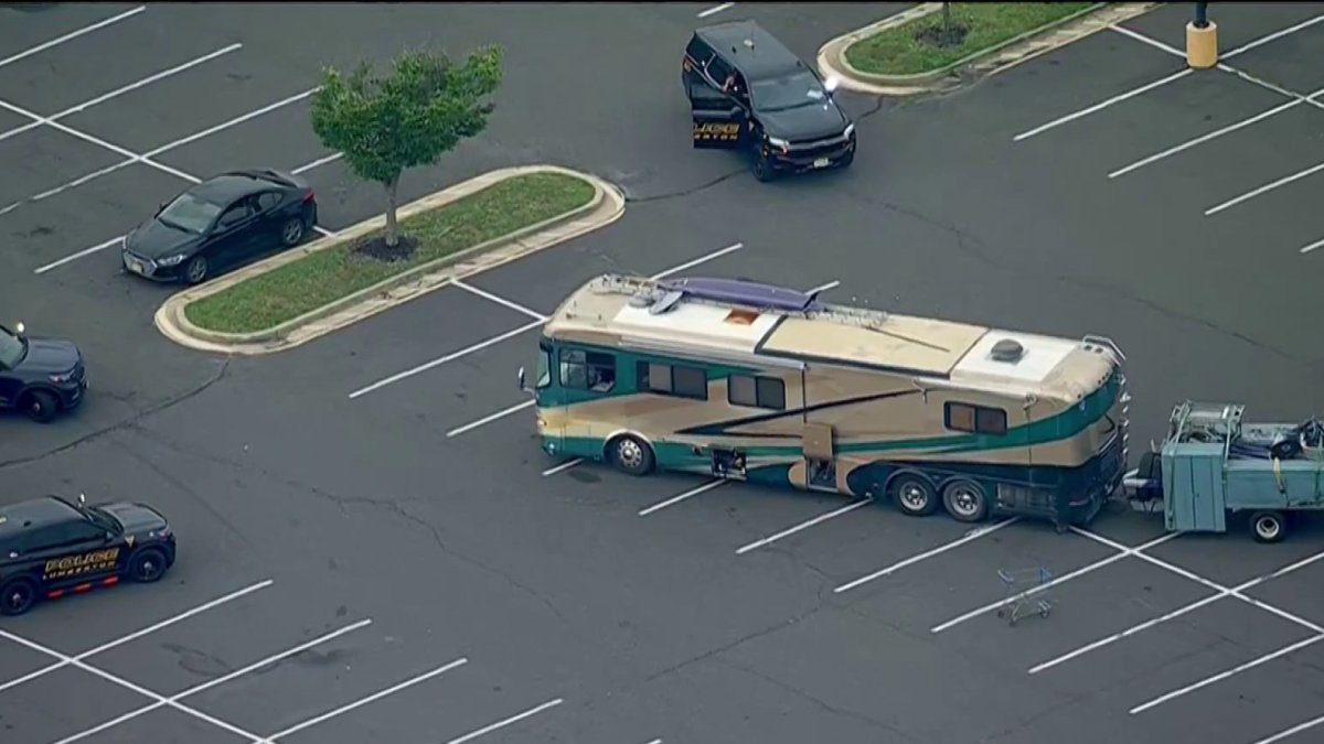 Man barricaded in vehicle at Walmart on Route 38