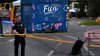 Two dead and five injured, including a young boy, in Seattle Center shooting, fire officials say