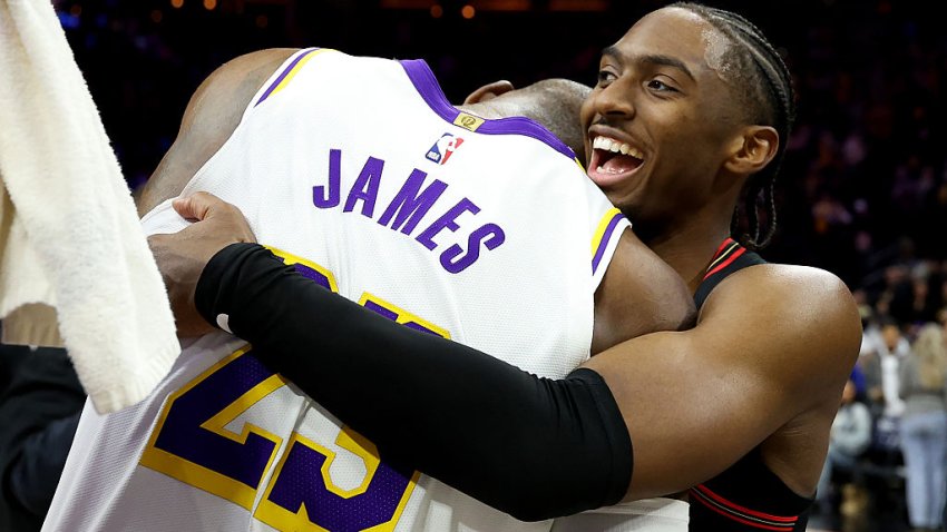PHILADELPHIA, PENNSYLVANIA – DECEMBER 07: Tyrese Maxey #0 of the Philadelphia 76ers hugs Lebron James #23 of the Los Angeles Lakers after a game at Xfinity Mobile Arena on December 07, 2025 in Philadelphia, Pennsylvania. The Los Angeles Lakers won 112-108. NOTE TO USER: User expressly acknowledges and agrees that, by downloading and or using this photograph, User is consenting to the terms and conditions of the Getty Images License Agreement. (Photo by Emilee Chinn/Getty Images)