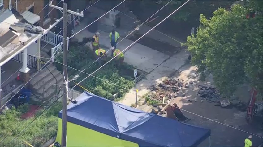 Philadelphia police excavating a pipe on Wednesday morning at the Olney home raided by investigators that is linked to at least one missing woman.
