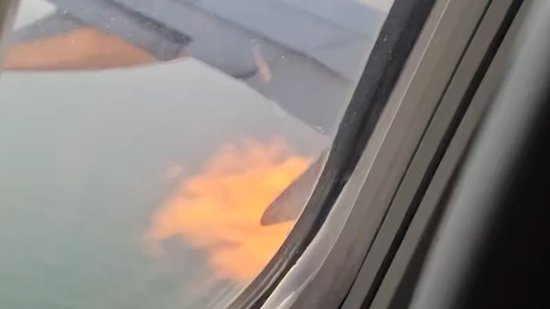 Flames shoot from engine after American Airlines plane hits birds during takeoff