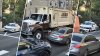 Trash truck side-swipes cars along Manayunk street, police say