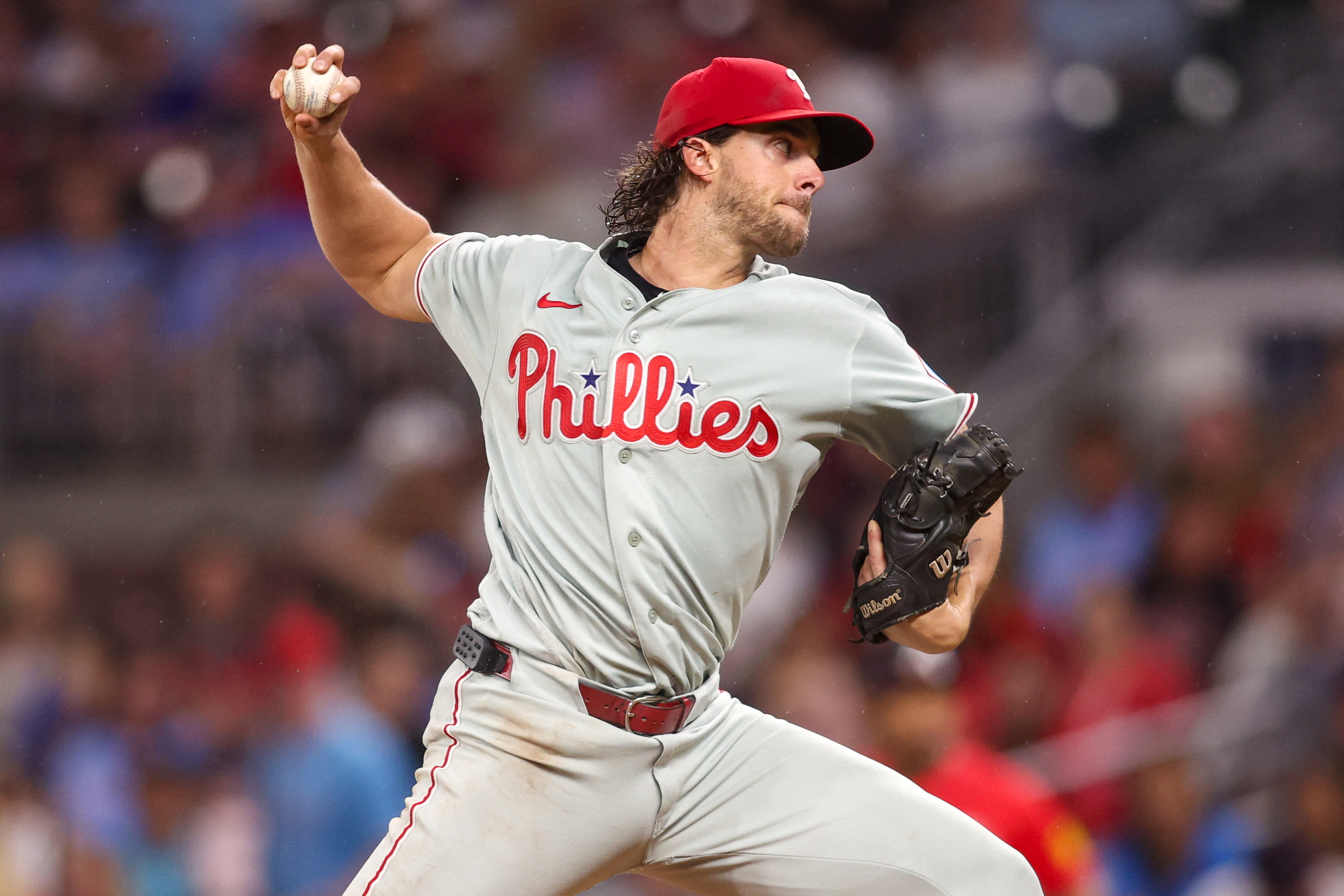 Sep 11, 2026; Atlanta, Georgia, USA; Philadelphia Phillies starting pitcher Aaron Nola (27) throws against the Atlanta Braves in the first inning at Truist Park. Mandatory Credit: Brett Davis-Imagn Images