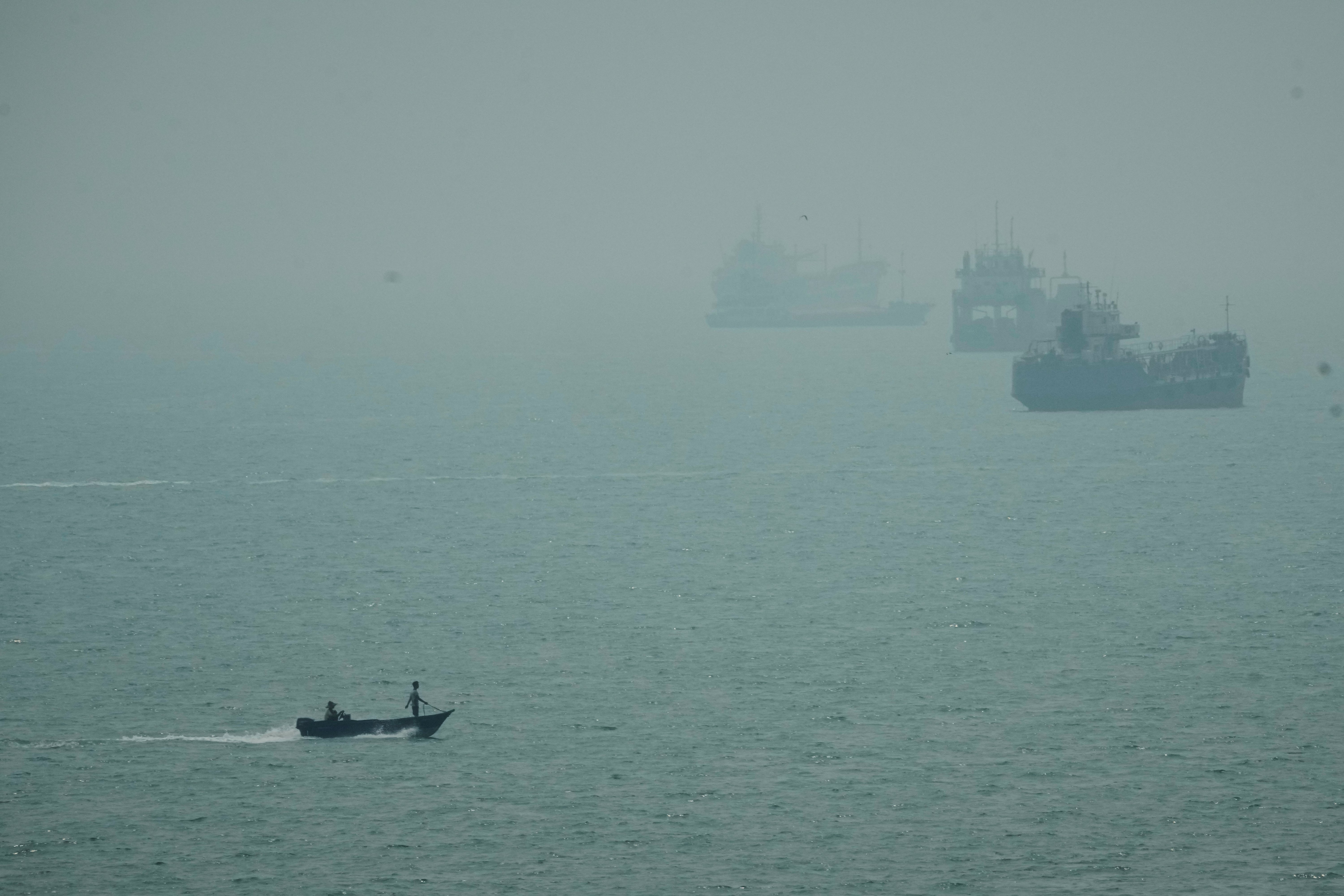 An Iranian commercial ship is struck near Strait of Hormuz with 1 dead, Iranian media say