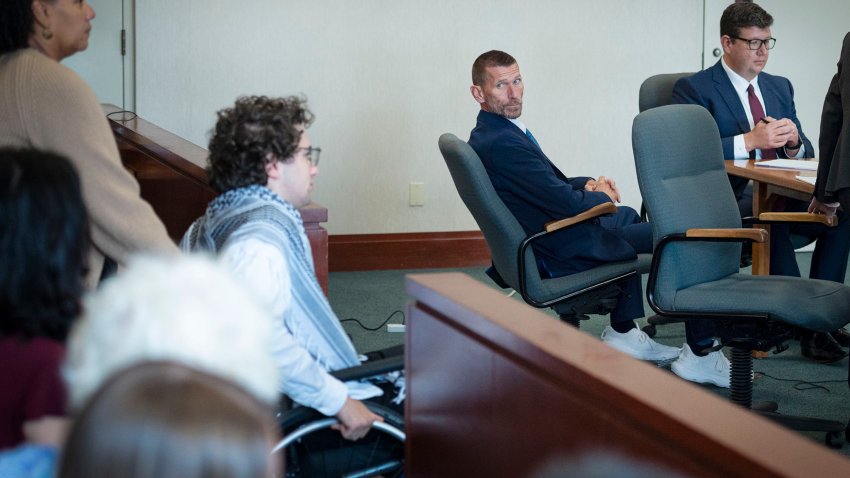 Jason Eaton watches as Hisham Awartani arrives to testify in Eaton's trial in Burlington, Vt., Monday, Sept. 14, 2026.