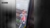 SEPTA investigating after viral video shows man hanging from moving train