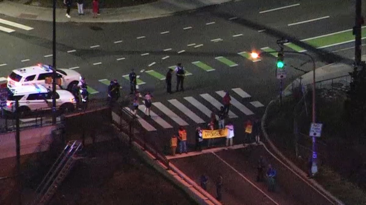 Protesters block 676 off ramp to Ben Franklin Parkway in Center City on Monday