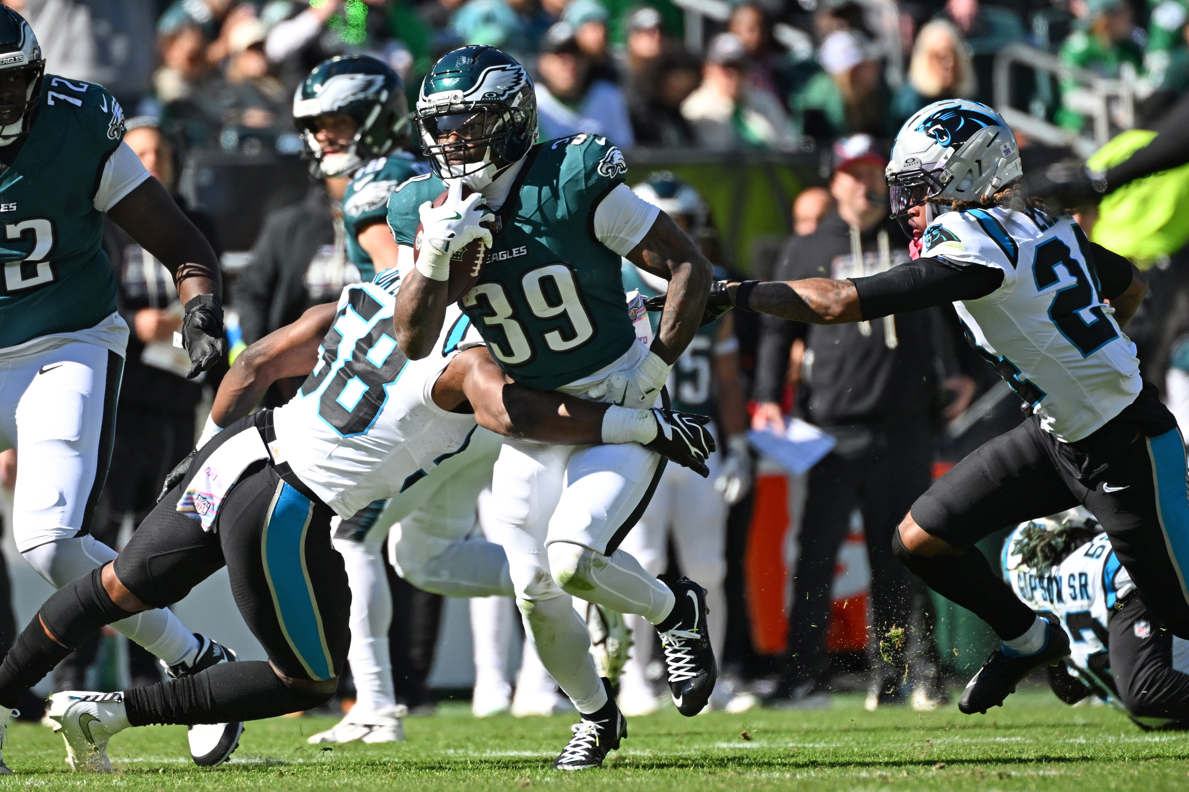 Oct 18, 2026; Philadelphia, Pennsylvania, USA; Philadelphia Eagles running back Dameon Pierce (39) is tackled by Carolina Panthers linebacker Bobby Okereke (58) at Lincoln Financial Field. Mandatory Credit: Eric Hartline-Imagn Images