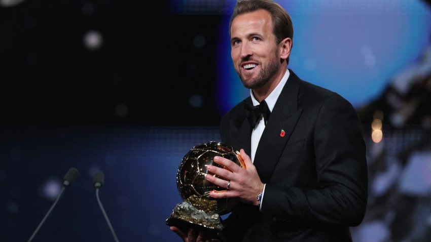 England and Bayern Munich forward Harry Kane smiles.