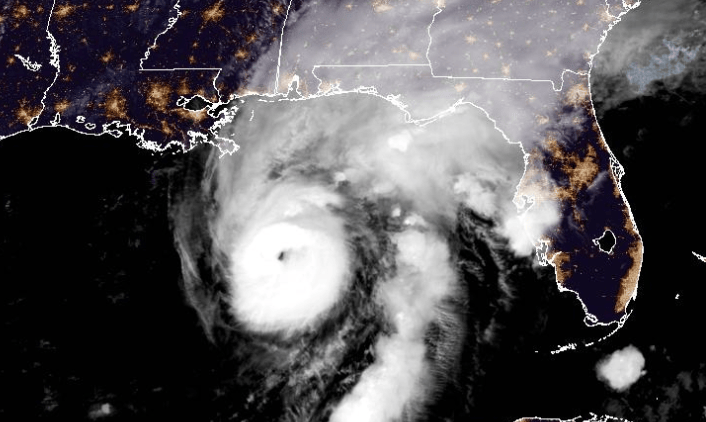 Residents board up windows, National Guard troops deploy as Hurricane Isaias nears Gulf Coast