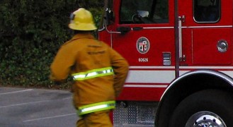 Firefighters Rescue Baby from Burning Minivan